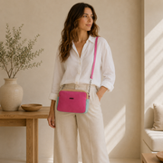 Bolso de piel rosa fucsia